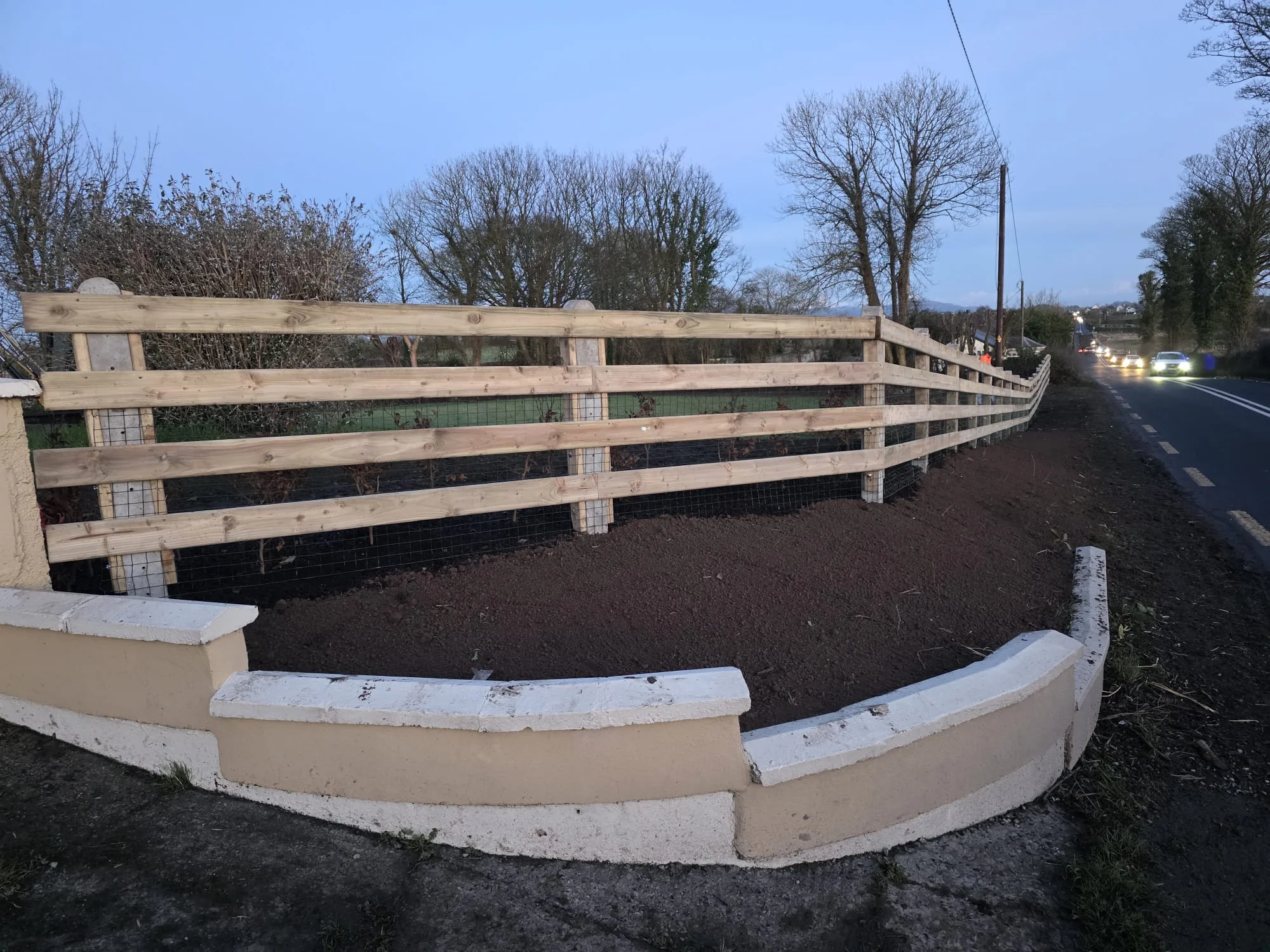White fence installation complete